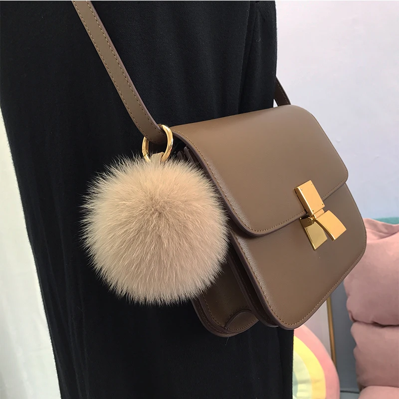 Chaveiro pompom de pele de raposa real fofo para mulheres luxo pele pompom chaveiro acessórios saco charme emo berloque jóias presentes