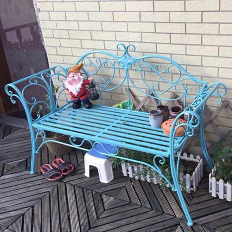 Outdoor garden benches, outdoor wrought iron table and chairs, three-piece set of open-air balcony, courtyard, park, photography