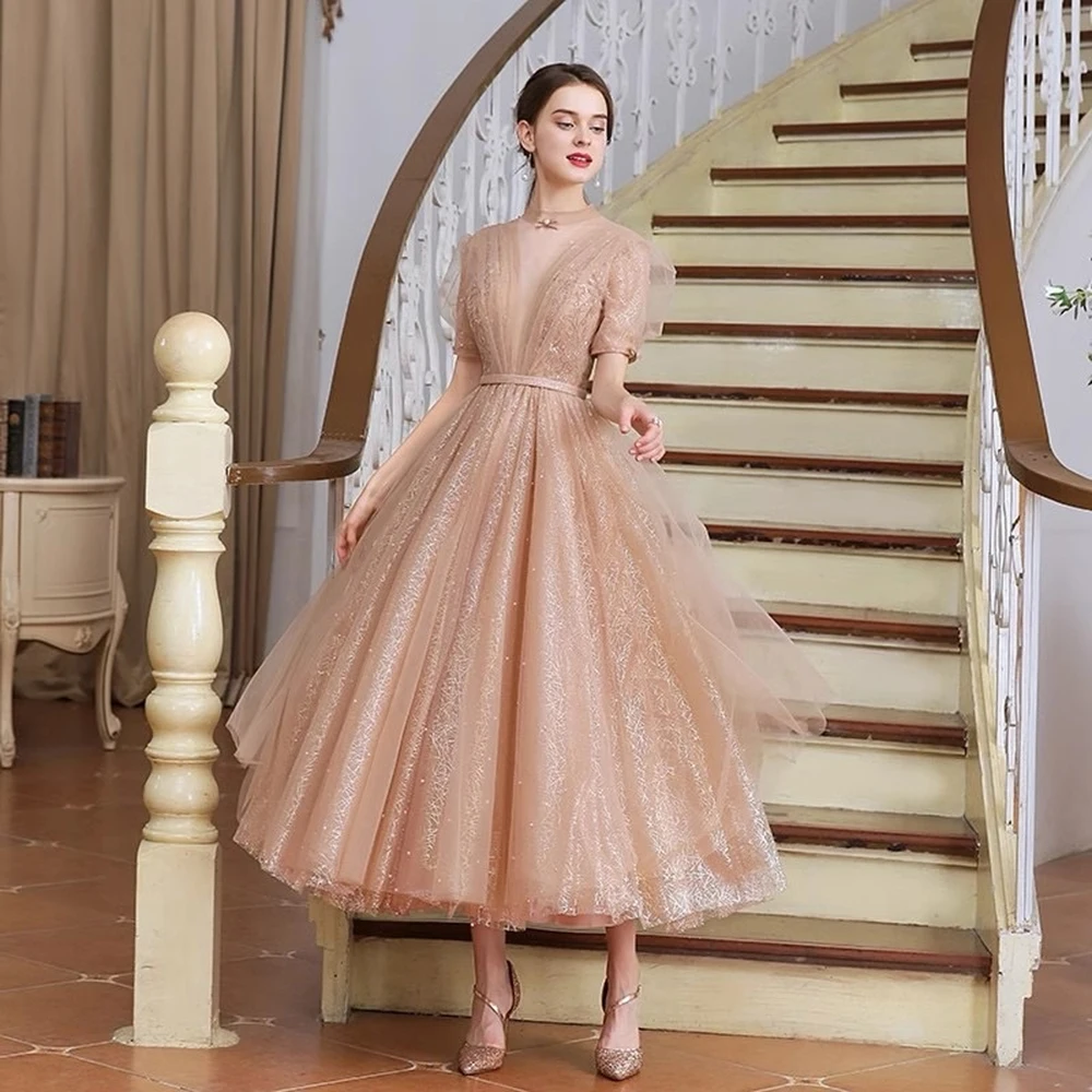 

Customized Champagne A-line Tulle O-neck Evening Dress Short Sleeves Draped Party Dress Sequined Backless Tea-Length Prom Gown