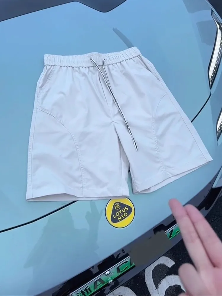 

American Sle Ice Silk Qui Dry Thin Cut Sports orts Мужские летние пляжные спортивные брюки с четырьмя пятьми разрезами Свободный крой с низкой талией