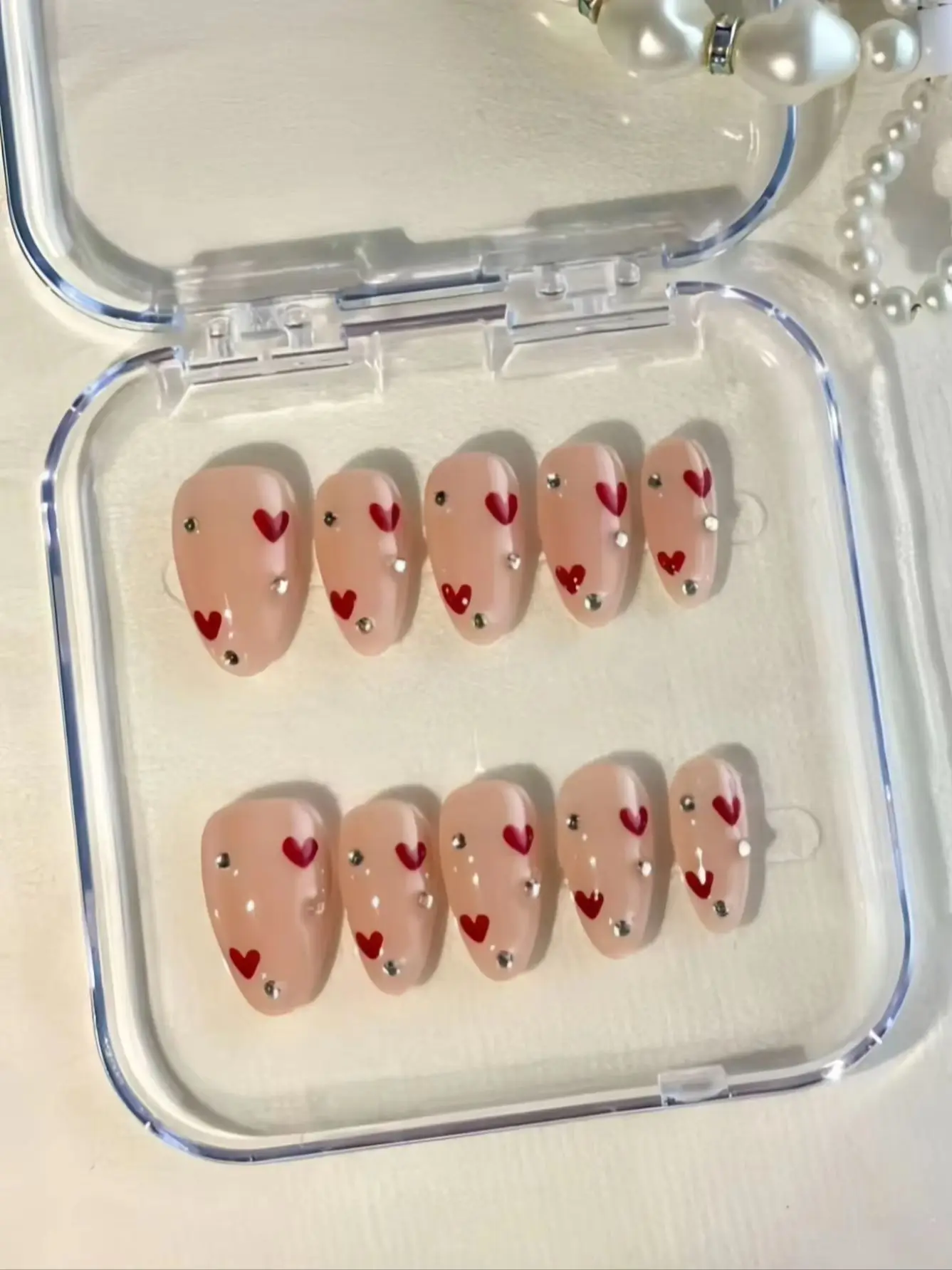 Sweet and Simple Wearable Nails, Medium Almond Shape, Nude Color with Transparent Base, Hand-Painted Red Hearts with Micro Silver Gems, Reusable Fake Nails