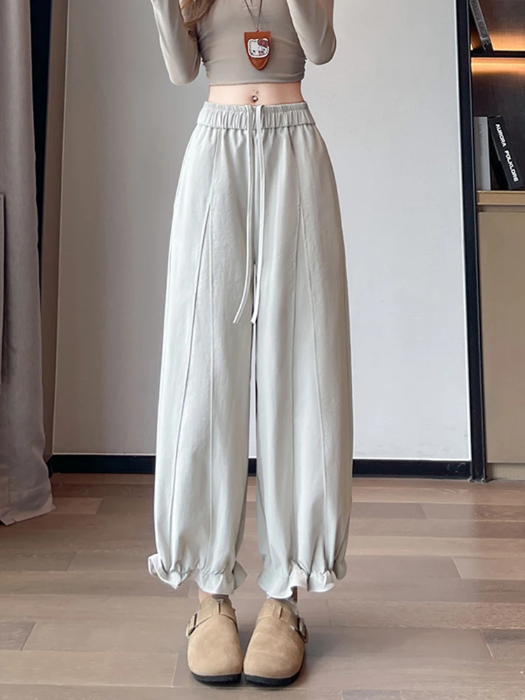 

Корейские широкие повседневные брюки из дерева с эффектом слэб для женщин, весенняя новинка, с эластичным поясом, фасон «Харлан», подходят для прогулок