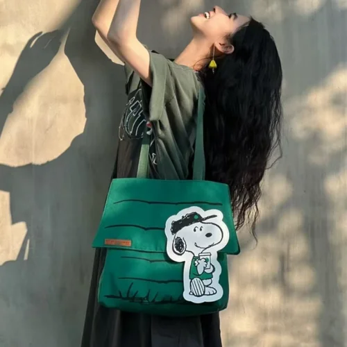 Imagen 1 del producto Nuevo bolso de mano pequeño y fresco de estilo perezoso informal con estampado de gran capacidad de Snoopy, bolso de hombro de viaje para niñas