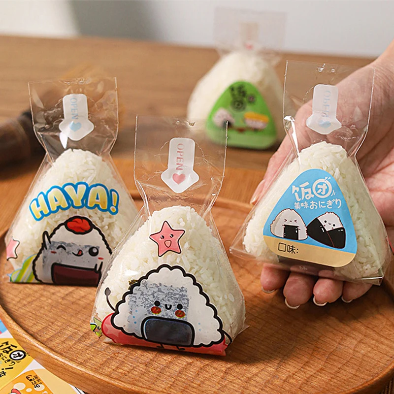 50 Uds. Bolsa de embalaje de bolas de arroz triangular portátil de dibujos animados bolsa de Sushi de algas marinas cocina japonesa hacer accesorios Bento pegatinas