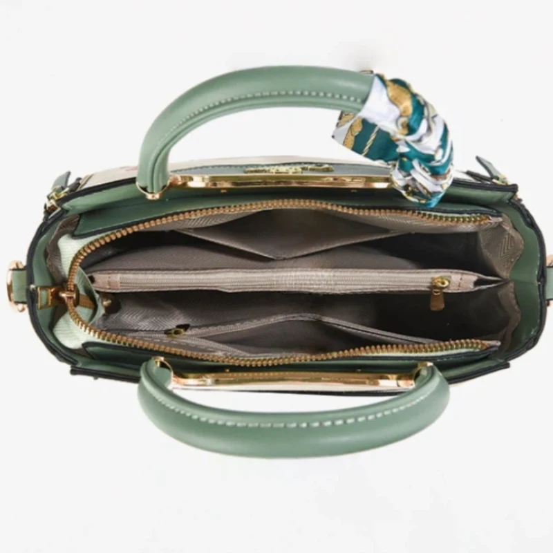 3-piece embroidered handbag set including a matching clutch and card holder, decorated with an exquisite pendant