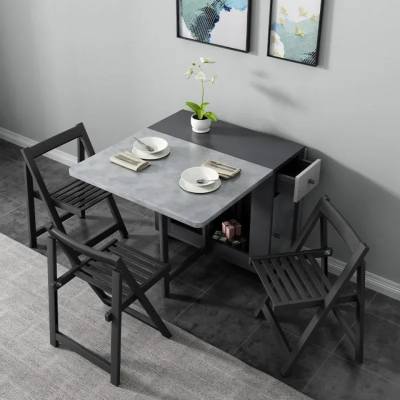 

Small household folding dining table movable with wheels dining table and chairs simple solid wood electromagnetic