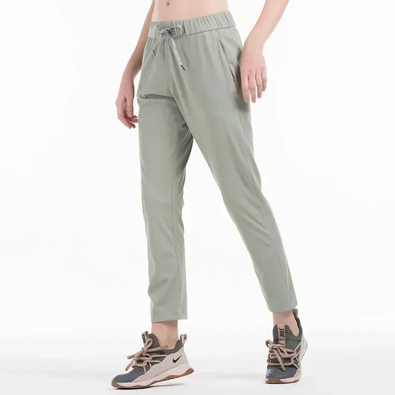 Lemon-Pantalon de yoga à la mouche pour femmes, leggings d'entraînement, de course, tissu de commande à 4 voies avec poches latérales, salle de sport en plein air, fjt