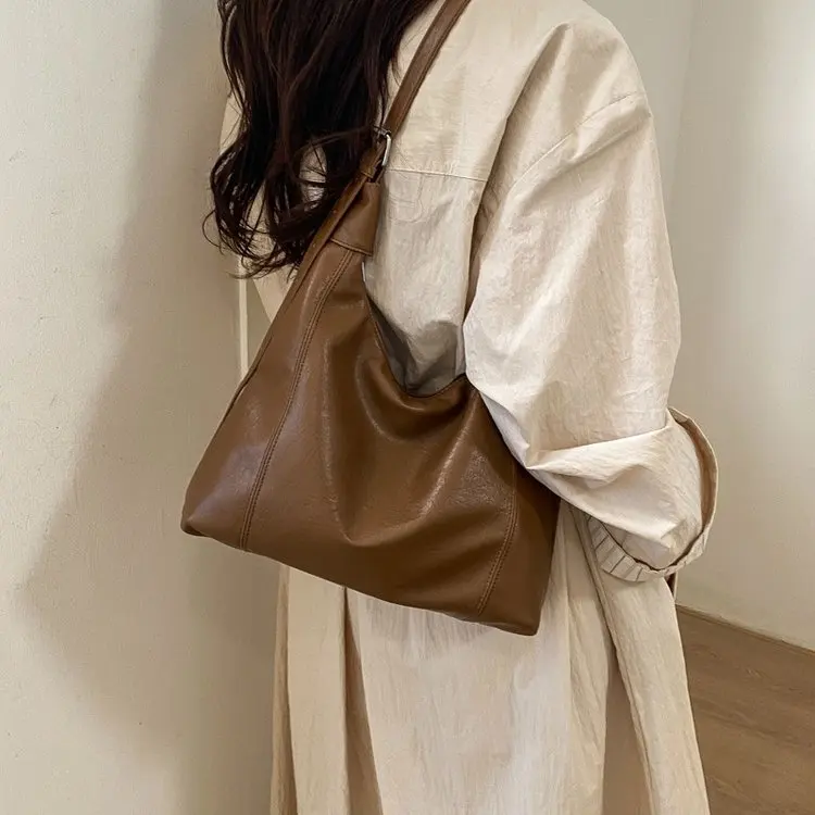 

Новая модная универсальная сумка-тоут из мягкой кожи премиум-класса 2026 года в стиле Lazy Style, женская сумка на плечо, сумка-багет, сумка на цепочке