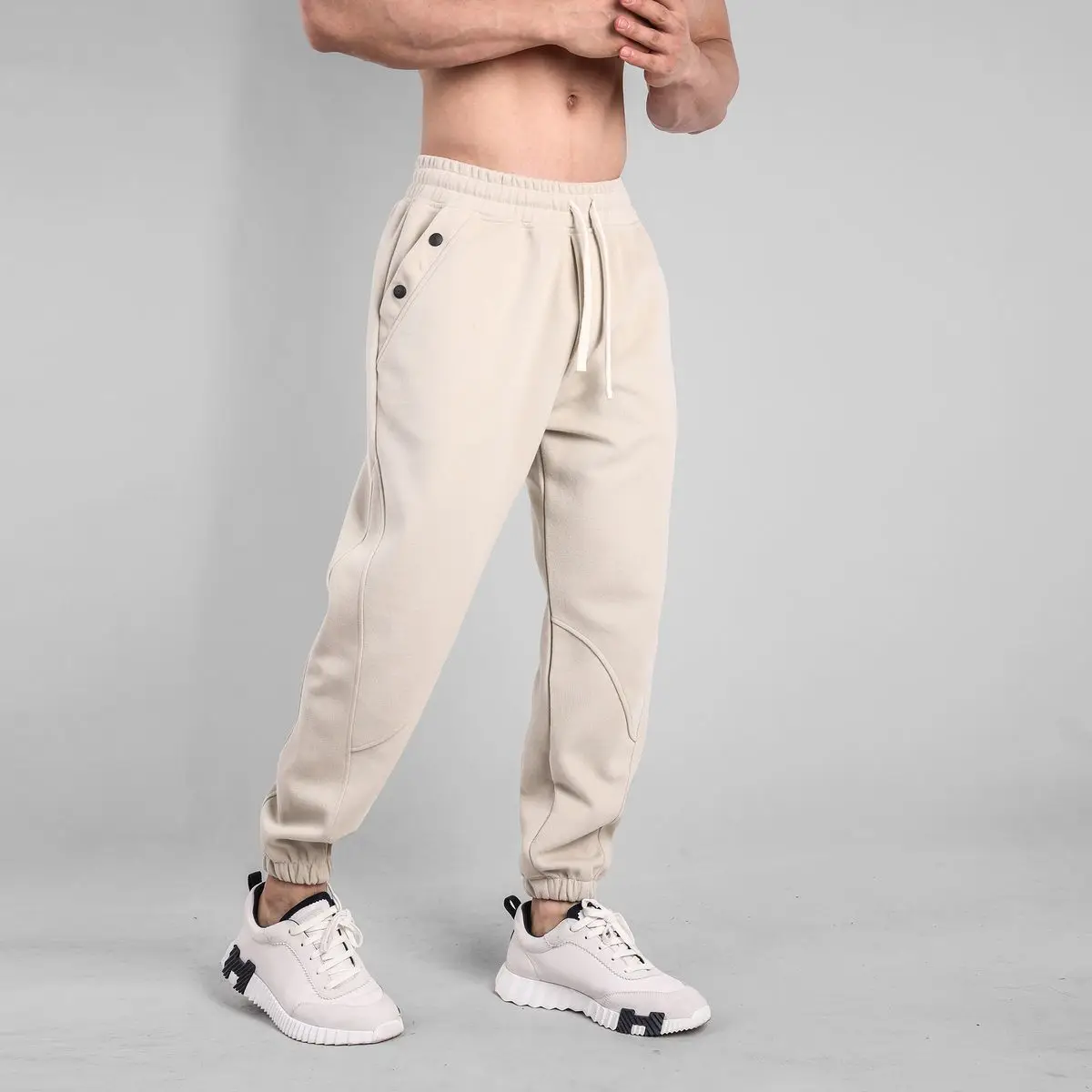 Pantaloni sportivi da uomo Harem pantaloni della tuta neri semplici per uomo vestiti popolari coreani pantaloni della tuta per adulti pantaloni della tuta di lusso