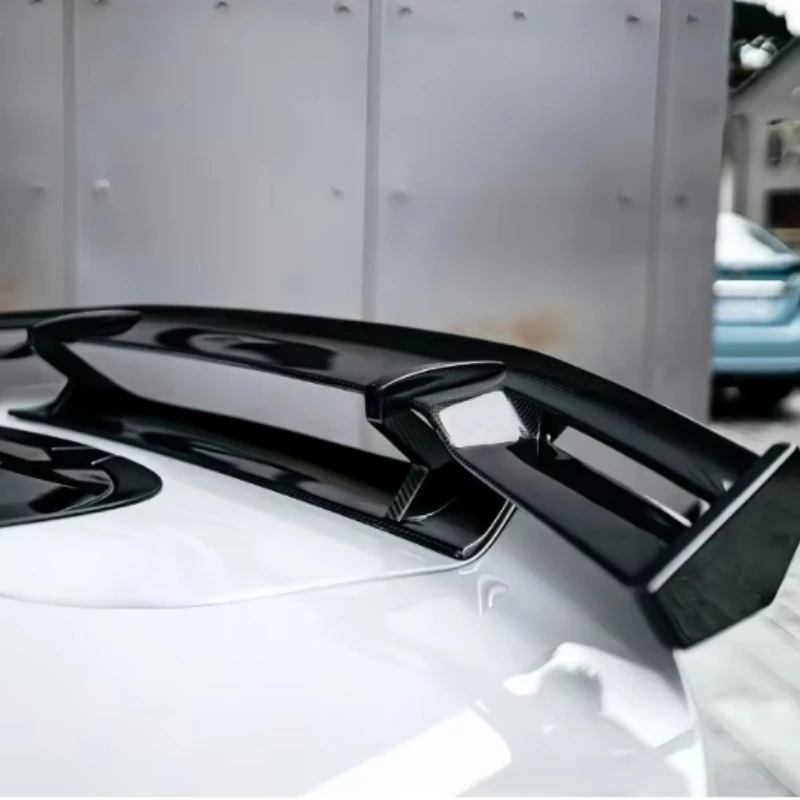 

Высококачественные задние спойлеры PRO-стиля из сухого карбона для McLaren GT от McLaren Modifies