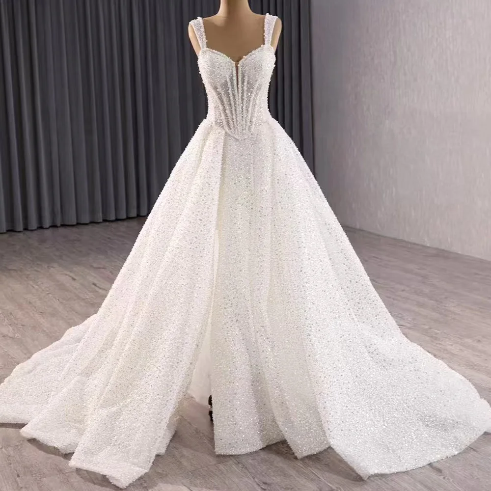 Luxurious Wedding Dress Spaghetti Straps Lace Up Back Bridal Dress Beading Pearls Sequined Customized A Line Dress