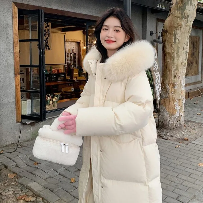 De nieuwe trendy katoenen gewatteerde jas in Koreaanse stijl, lange losse jas, katoenen gewatteerde jas, klassieke unieke winter-woon-werkverkeer