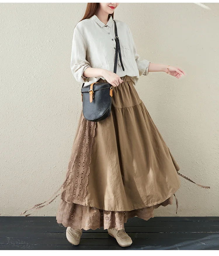 Rok bertali berlapis linen dengan sulaman tebal dan ikat pinggang elastis, sedang hingga panjang, desain A-line yang manis