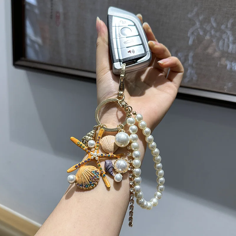 

Starfish and shell alloy keychain pendant ocean pearl lady lobster clasp bag charm