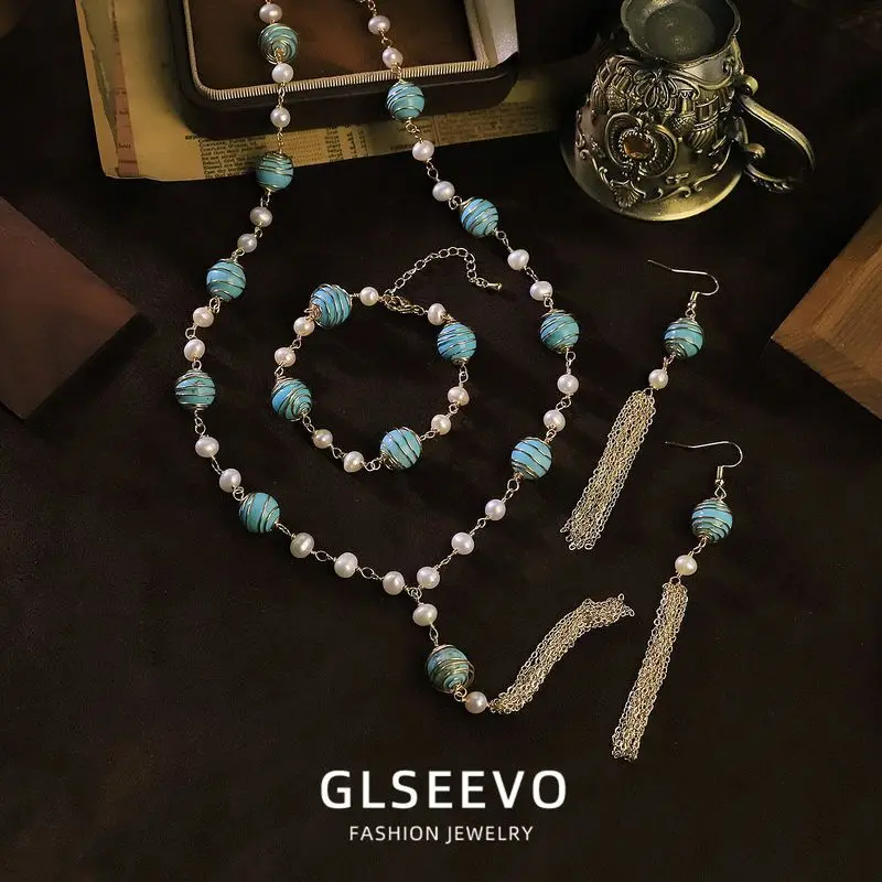 Design: A Set Of Three Pieces Including A Natural Pearl Wire-Wrapped Turquoise Necklace Bracelet And Earrings – Ver