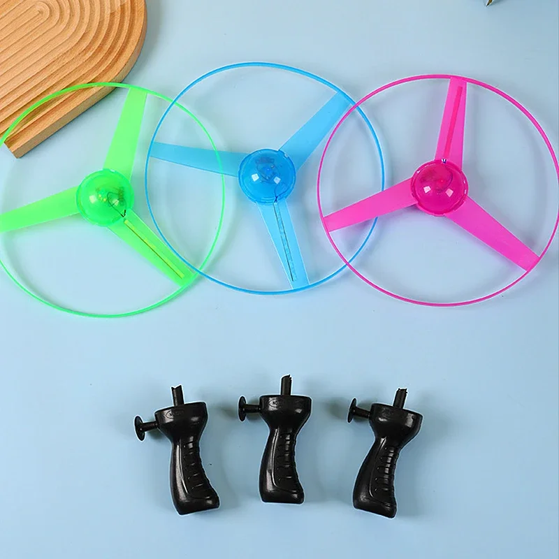 Divertido disco volador luminoso, hélice LED, juguete de iluminación, cadena de tracción, juguete volador iluminado, tope, juegos al aire libre, regalos para niños