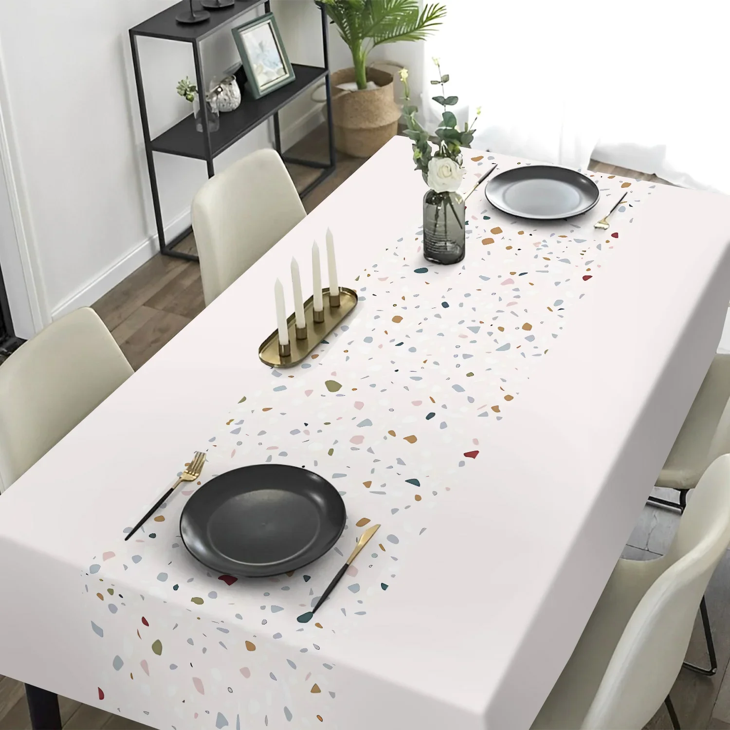 One piece of minimalist style polyester tablecloth with colorful patchwork pattern, suitable for washing and use as a table cove