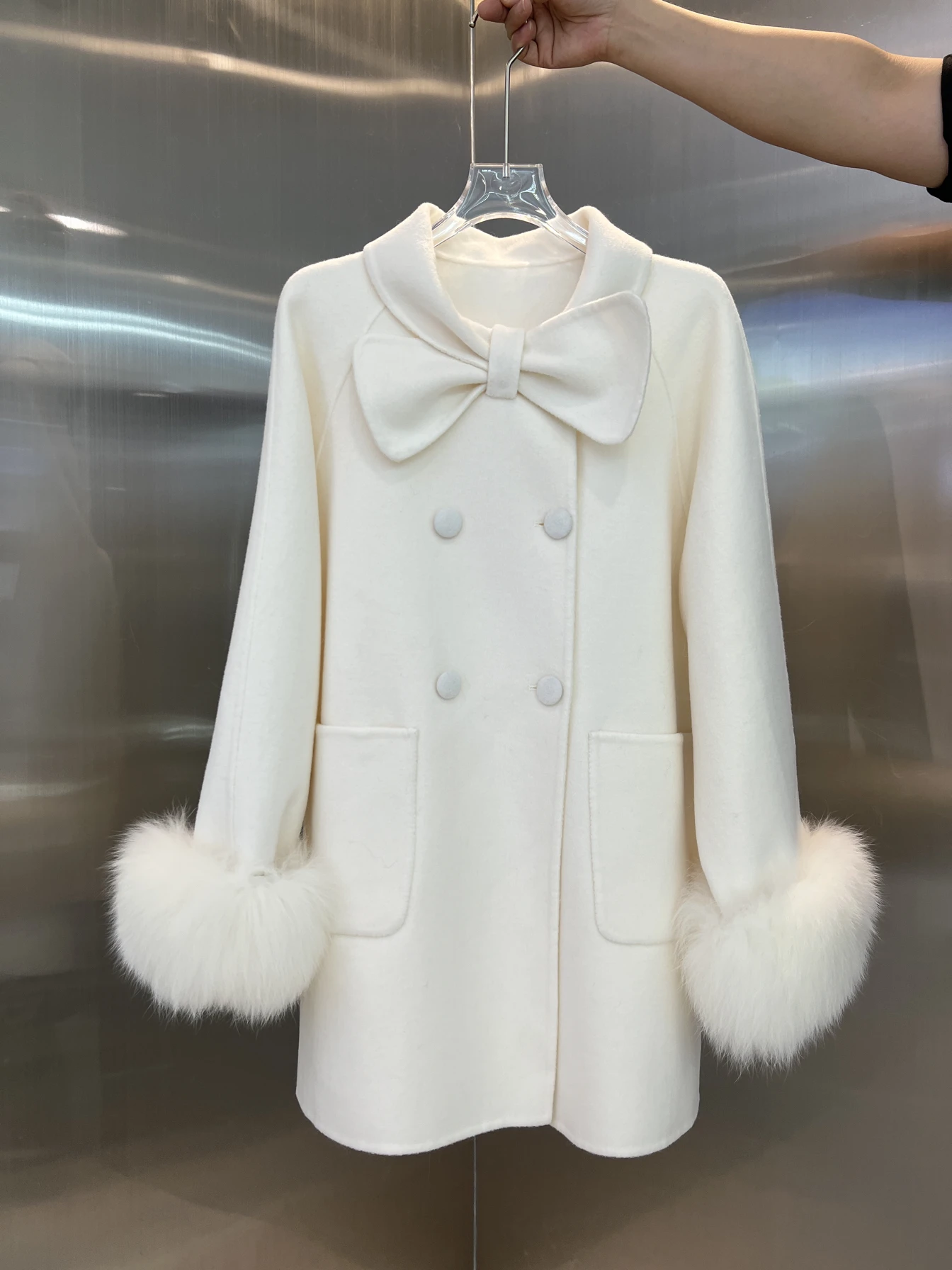 

2024 autumn and winter new Korean version double-sided cashmere coat women's medium and long fox fur collar bow woolen coat