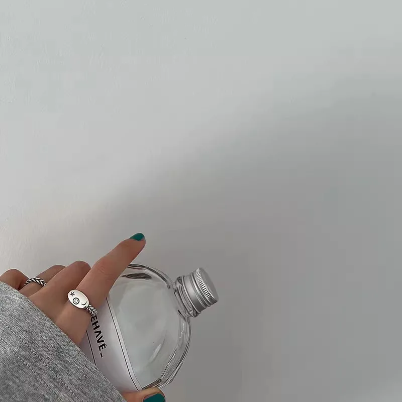 

Old Japan and Korea fashionable ring female ins wind smiley face star moon oval card weaving casual temperament index finger