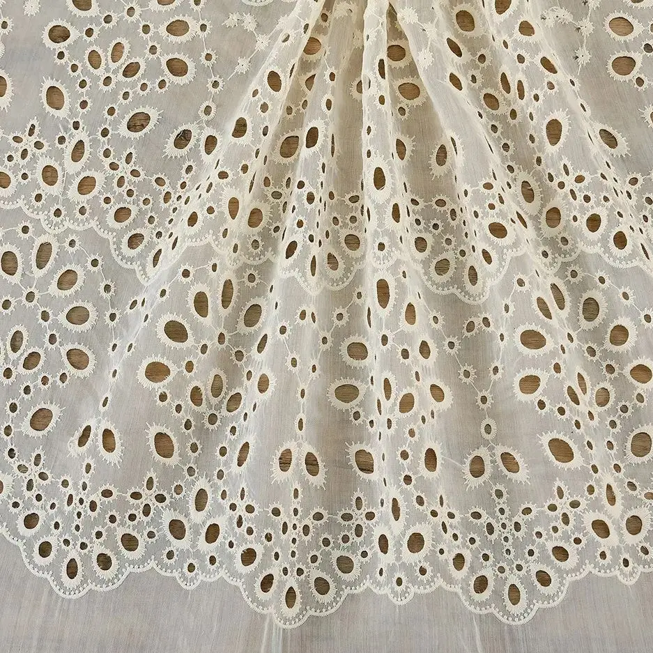 

100%Cotton beige hollow perforated embroidery fabric is soft and breathable, used for clothing handmade DIY sewing fabrics