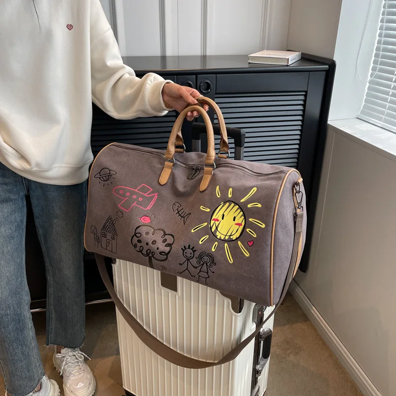 large-capacity-canvas-travel-bag-women's-casual-lightweight-shoulder-crossbody-bag-handbag-leisure-travel-bag-female-model