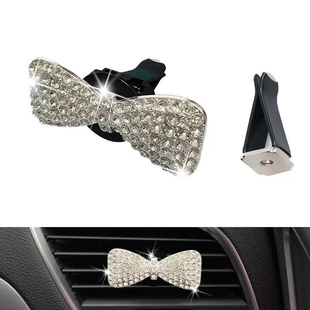 

Car air conditioner perfume clip, with fragrance piece, white pink, metal bow, Austrian rhinestone inlay, fresh air in the car