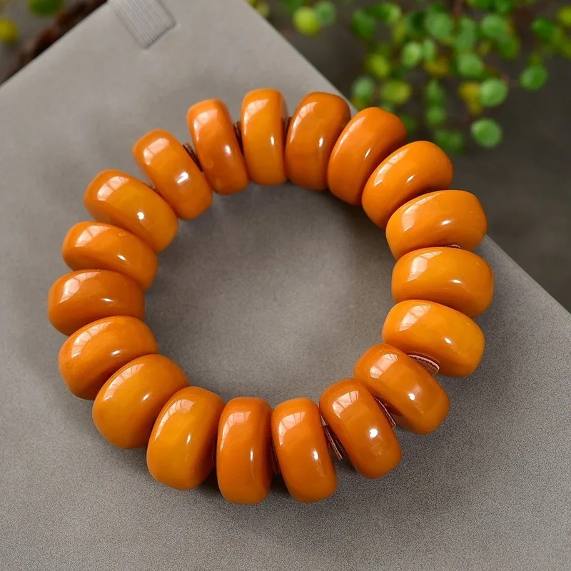 Orange- bracelet with chicken oil red second-generation old honey amber wheel and disc beads