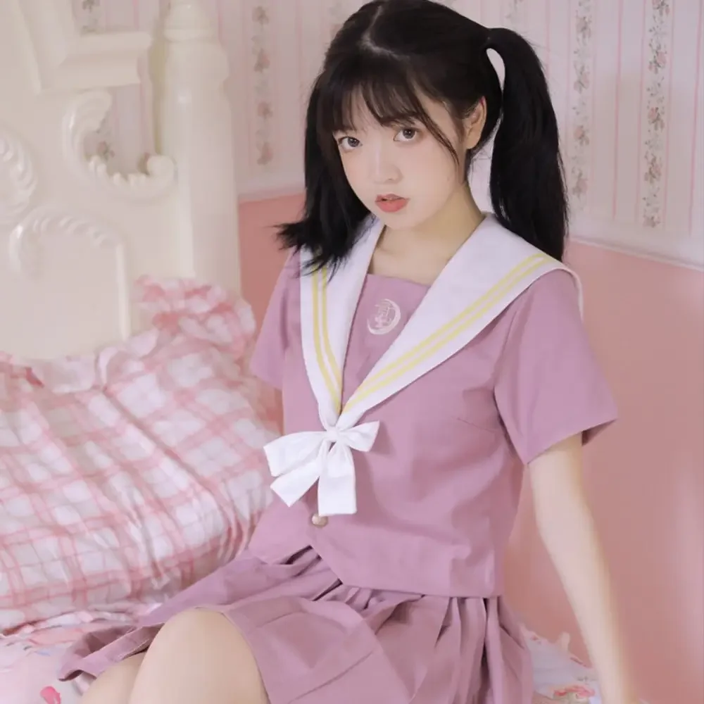 Set uniforme per ragazza scolastica coreana e giapponese Set di orchidee di giada rosa Abito Jk di base Gonna a pieghe Sailor Club Anime COS Costumi da donna