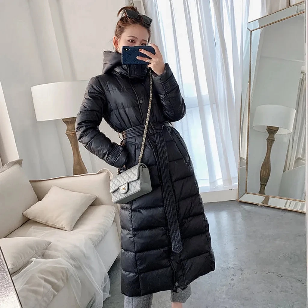 

Black Winter down Jacket For women Medium long Korean version Slim Waist cinching Slimming Over knees 2025 New Hooded Warm Coats