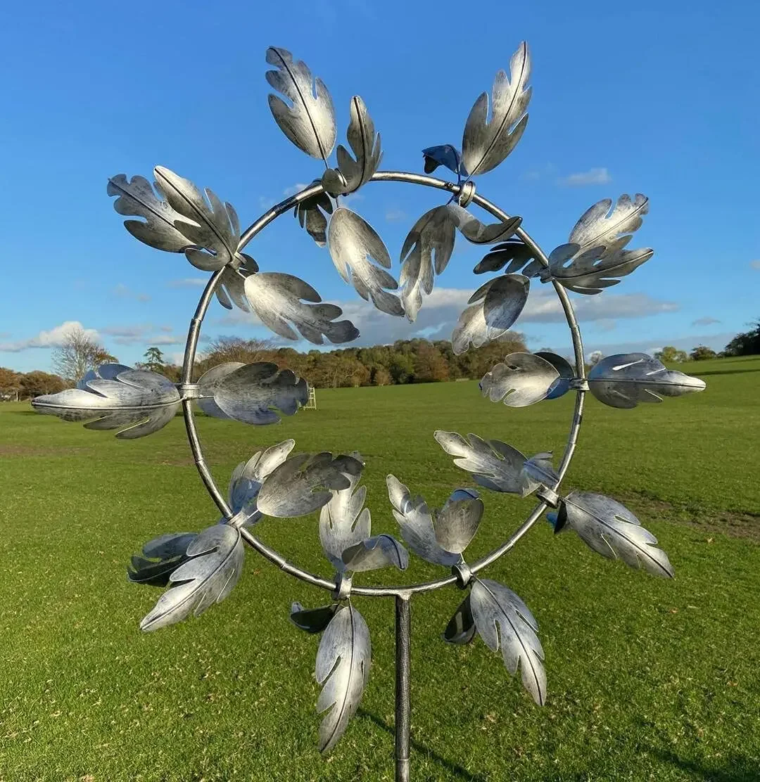 Abstract wind powered kinetic windspinners sculpture Unique and Magical Metal Windmill