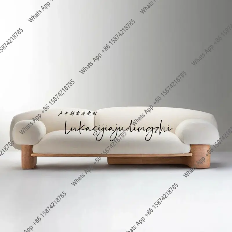 

Italian minimalist irregular living room homestay designer special-shaped arc snow-capped mountain high-end sofa customization