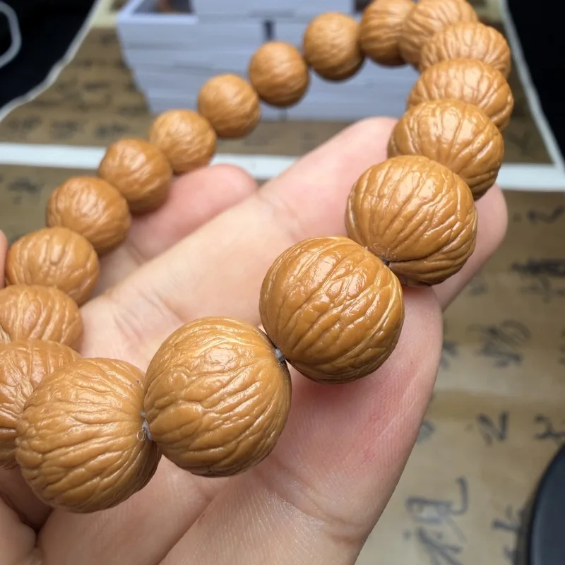Monkey head walnut bracelet, natural, unpolished, phoenix feather design, Beijing-style eight-sided beads single strand, unisex