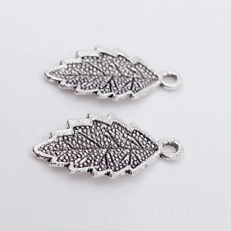Factory Direct Sales 100Pieces DIYZinc Ornament Plant Leaves Feather Pendant 23*12MM Clothing Bags and Gifts