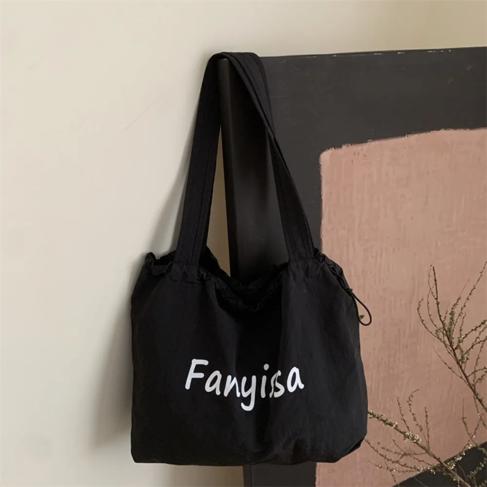 

Simple Korean Drawstring Tote Bags Casual Lightweight Letter Shoulder Bag Designer Large Capacity Handbag Outdoor