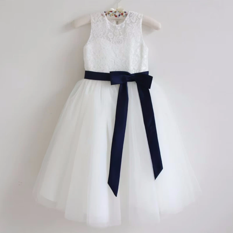 Abiti da ragazza di fiori bianchi Appliques di Tulle con fiocco blu Navy senza maniche per abiti da prima comunione di compleanno di nozze