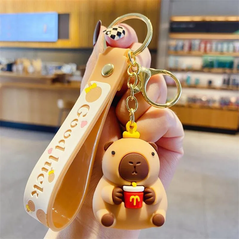 

Keychain Cute Capybara Keychain with Good Luck Wrist Strap Soft Rubber Pendant Cartoon Bag Charm Car Key Accessory Kawaii Cozy