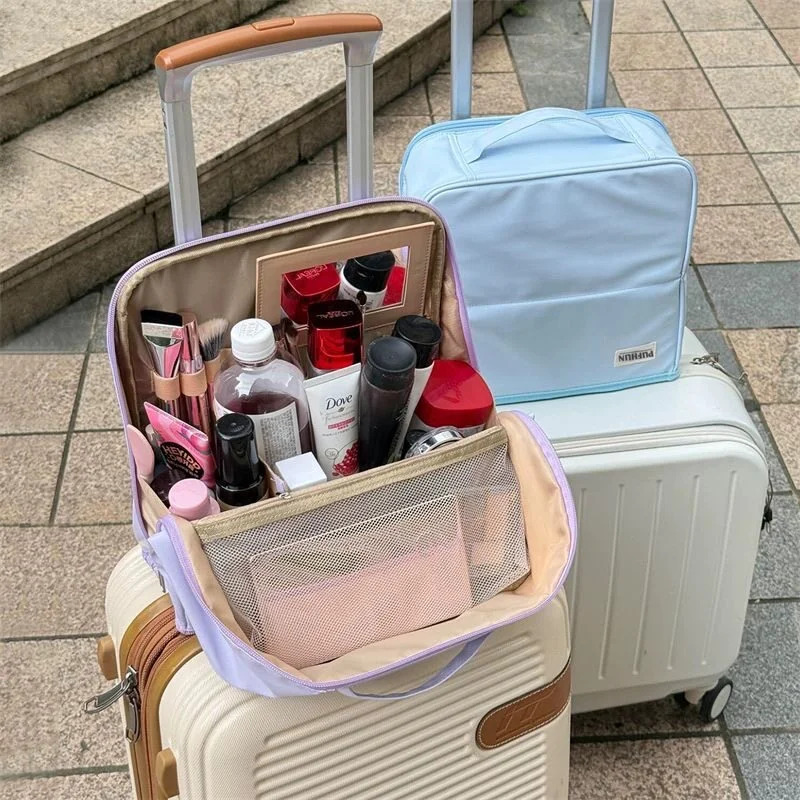 Large-capacity multifunctional partitioned portable makeup bag with mirror and stand-up feature for travel and toiletry sto