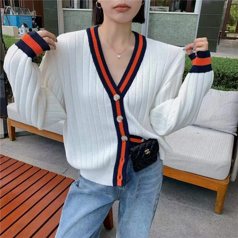 

Stitching striped knitted cardigan women 2023 autumn and winter Western long sleeve loose sweater cardigan female outside