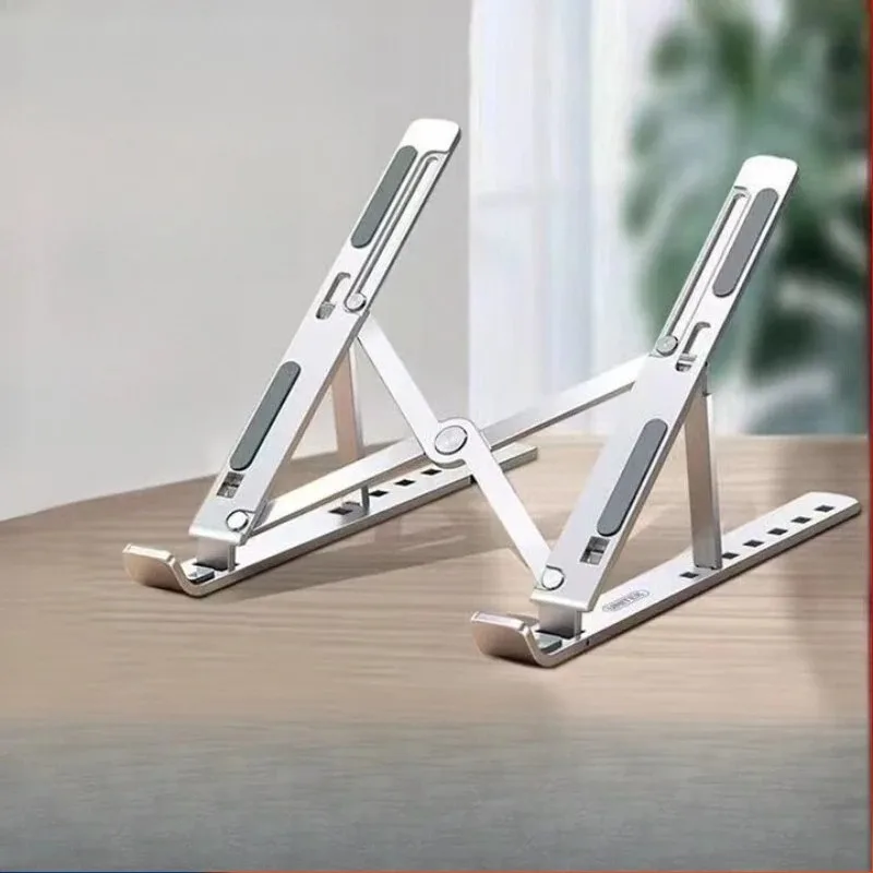 

Laptop holder, storage rack, heightening heat sink, folding portable bracket