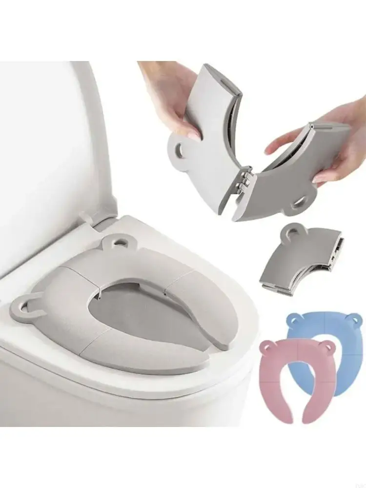 

Дети путешествуют туалетным сиденьем складного складного пространства.