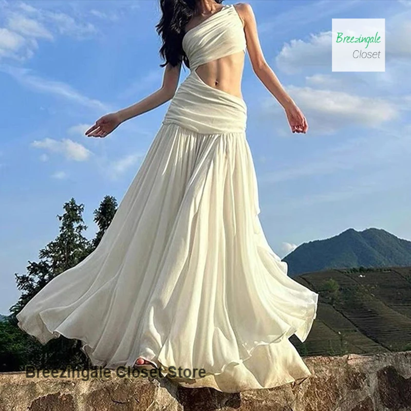 

French niche high-end dress with sloping shoulders and waist-exposed women's summer new fashion seaside holiday style dress