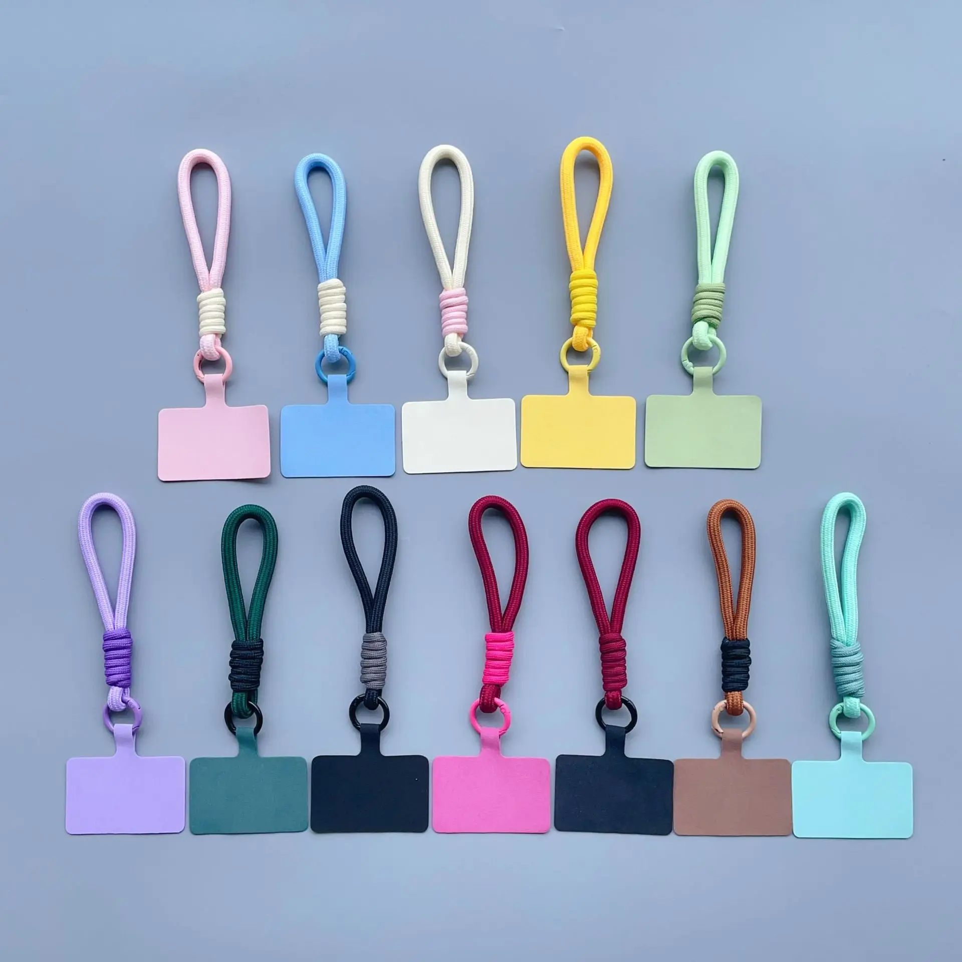 Corda di Nylon da polso intrecciata a mano con cordino per telefono corto con blocco di colore della batteria portachiavi universale per fotocamera braccialetto a catena per telefono Anti-perdita