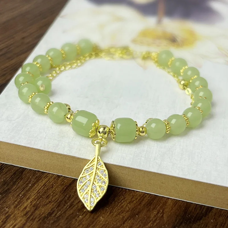 

Golden Branches and Jade Leaves Hetian Jade Bracelet Women's Light Luxury Antique Leaves Double-Layer Girlfriend Bead String