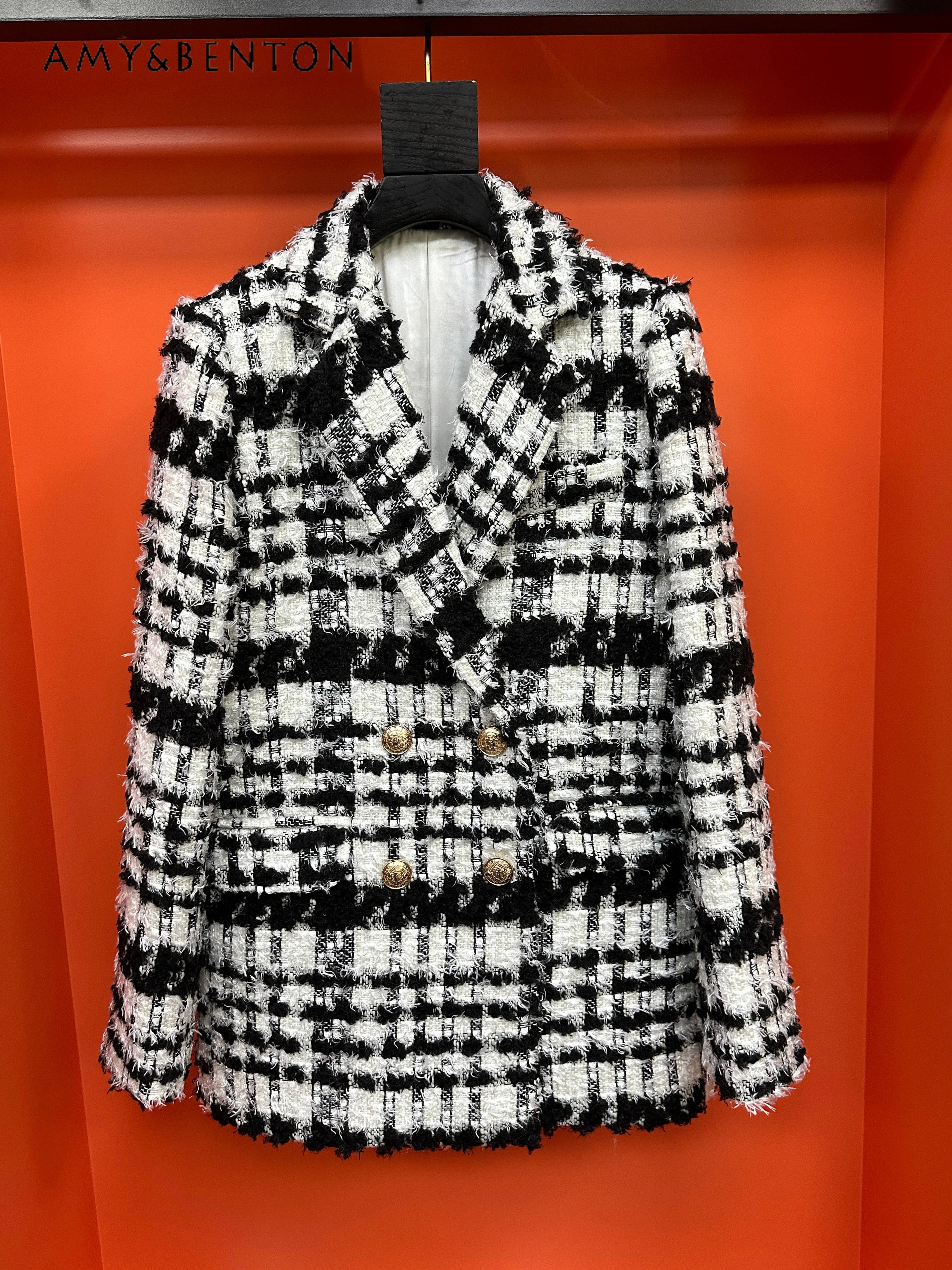 Cappotto di lana sottile allentato doppiopetto in bianco e nero stile pendolare Giacca da donna con nappe da socialite francese