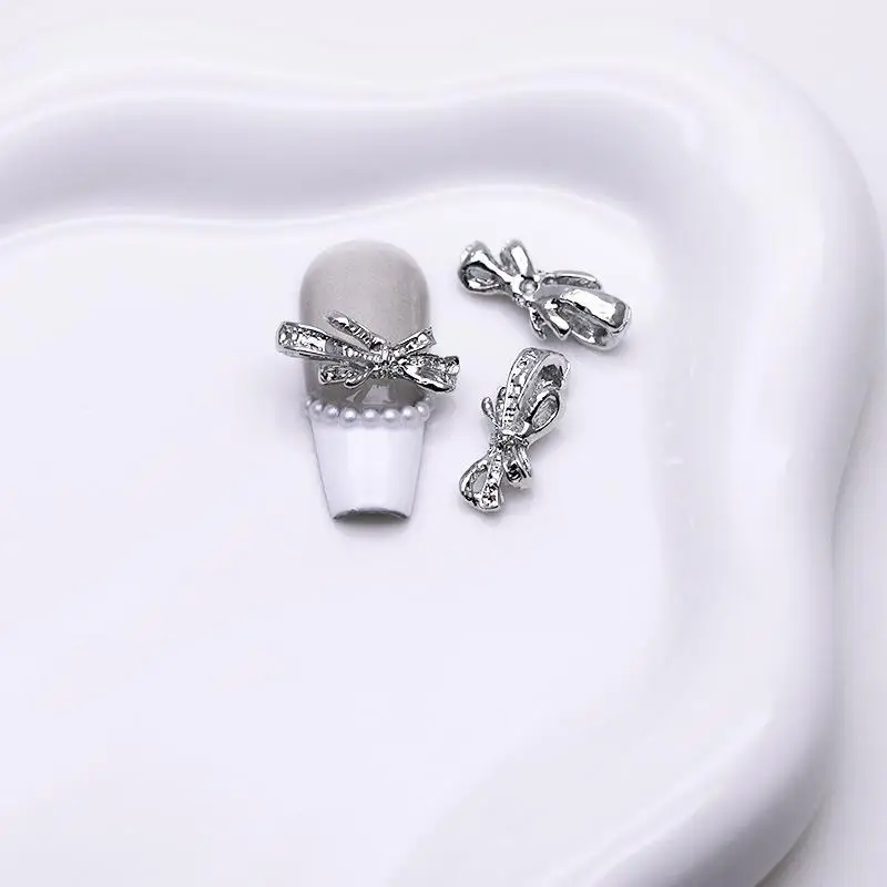 Breloques 3D en alliage pour Nail Art, 20 pièces, bijoux de luxe avec nœud Kawaii, or, argent, strass, décoration, accessoires de bricolage, pièces