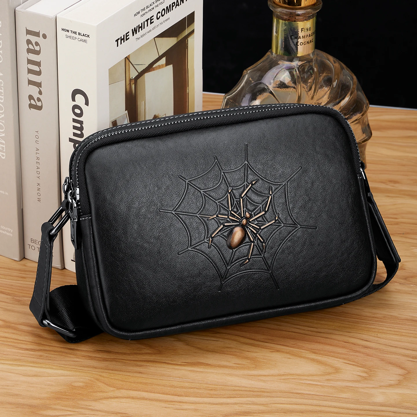 

Leather men's shoulder bag, lightweight and fashionable small backpack, casual multifunctional shoulder bag