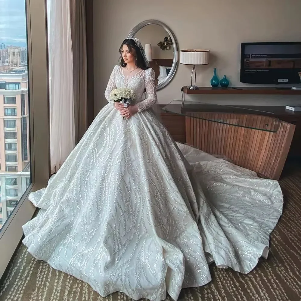 Luxury Sequin Long Sleeve Wedding Ball Dress Crystal Sparkling Beaded O-Neck Gown with Long Train for Dubai Bridal Occasions