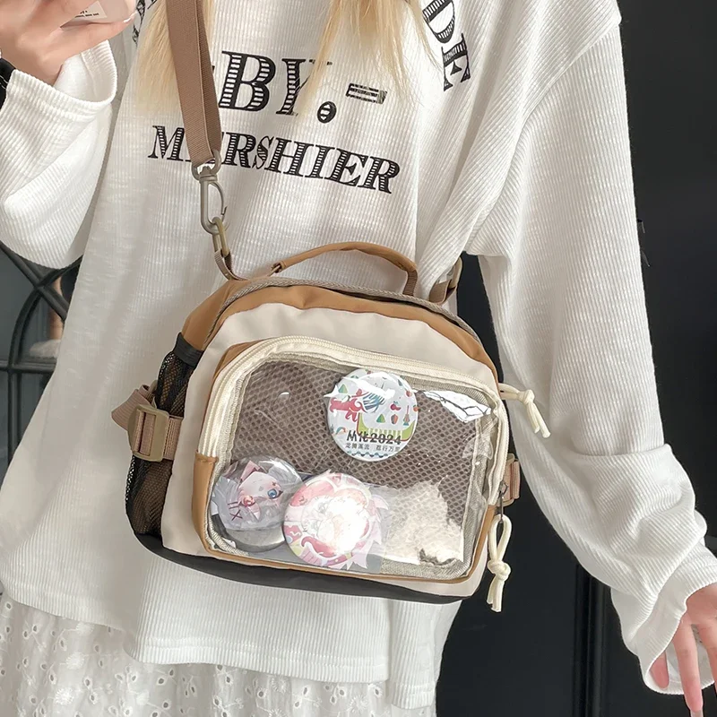 Mochila  retazos con bolsillo transparente para insignia, correa cruzada Convertible, bolso de moda multifuncional estilo Anim