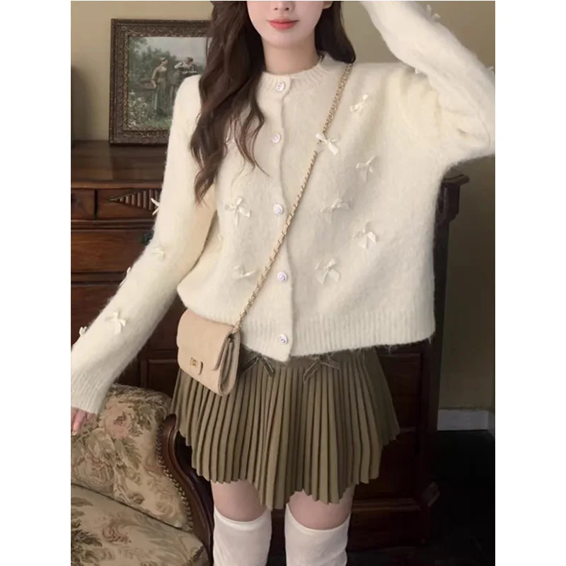 Spring and Autumn New Korean Version Loose Round Neck Bow Knitted Cardigan Women's Design Sense Sweet Soft Waxy Sweater Jacket