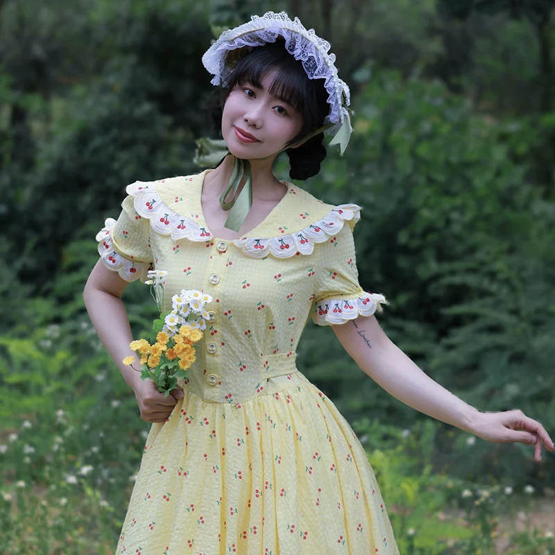 AnXin SH Vintage Prinzessin gelbe Baumwolle Kirschdruck Blumenspitze V-Ausschnitt Kurzarm Knopf Reißverschluss individuelles Abendkleid